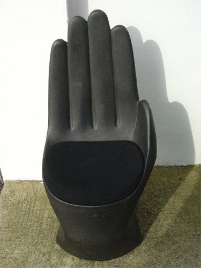 Hand deals palm chair